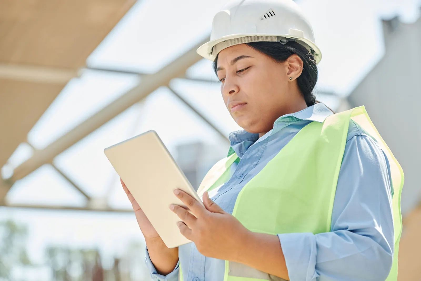 Engineer checking data on a tablet